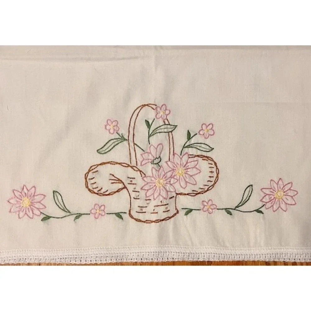 Vintage pair of pillowcases, basket and floral embroidery